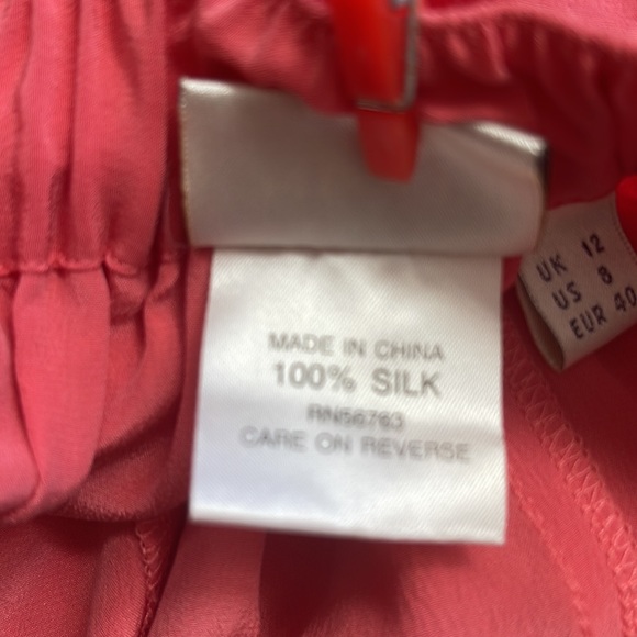 Pinkish Orange silk relaxed fit shorts. - Picture 5 of 6